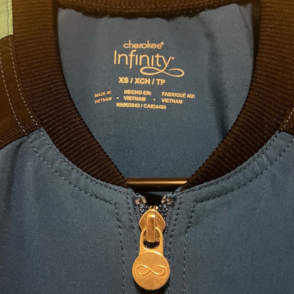 Cherokee Infinity Royal Blue Bomber Scrub Jacket - image 1